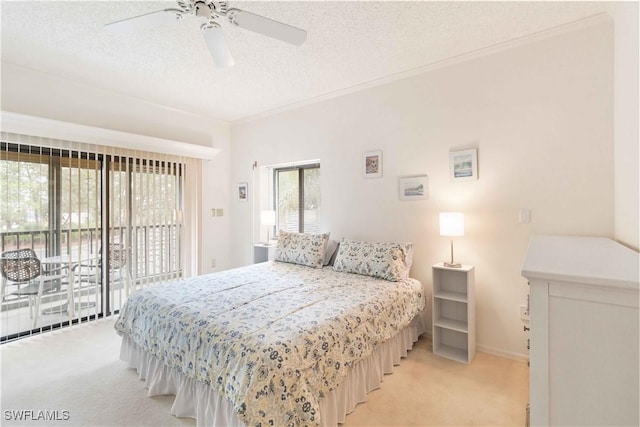 carpeted bedroom with crown molding, a textured ceiling, access to outside, and ceiling fan