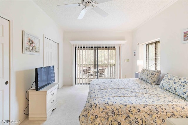 bedroom with light carpet, access to exterior, a textured ceiling, and ceiling fan