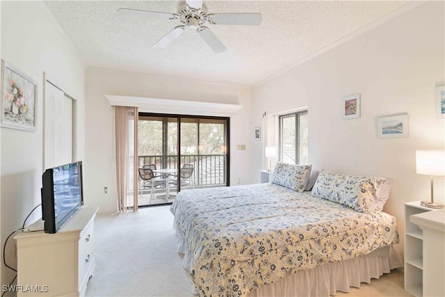 bedroom with light carpet, a textured ceiling, a closet, ceiling fan, and access to exterior