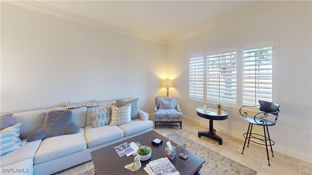 living room with baseboards and ornamental molding