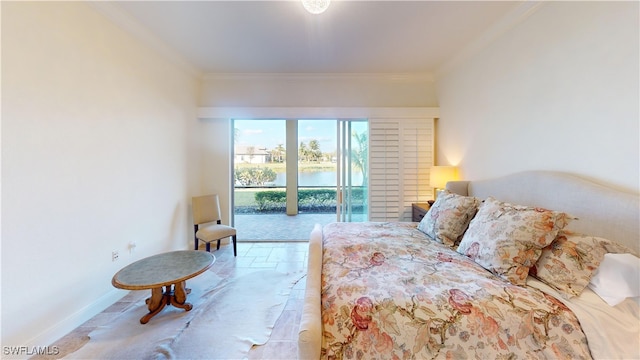 bedroom featuring stone tile flooring, baseboards, and ornamental molding