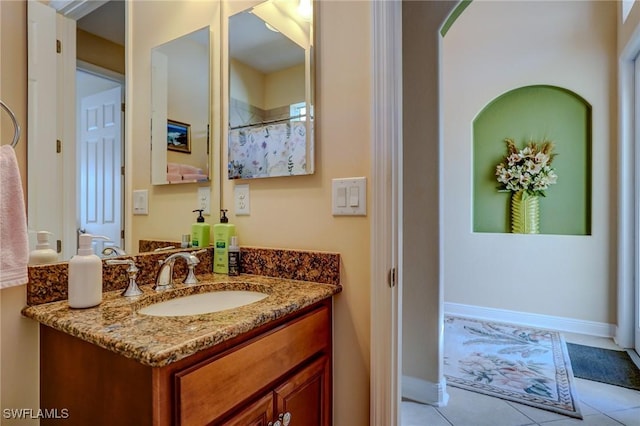 bathroom featuring vanity and tile patterned flooring