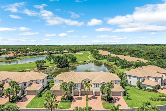 birds eye view of property featuring a water view