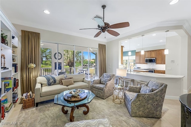 tiled living room featuring crown molding and plenty of natural light