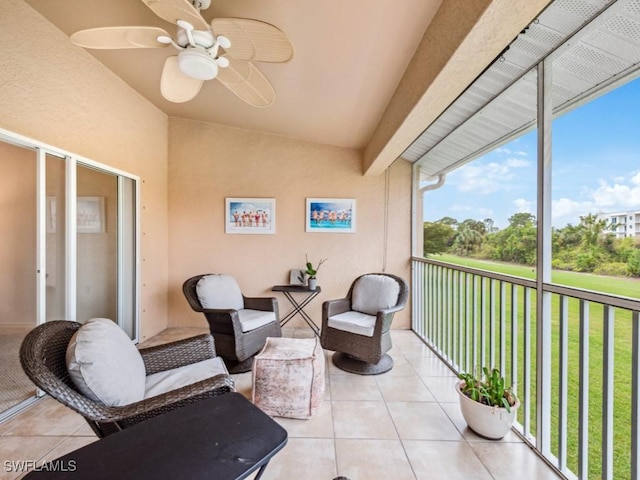 sunroom / solarium with vaulted ceiling and ceiling fan