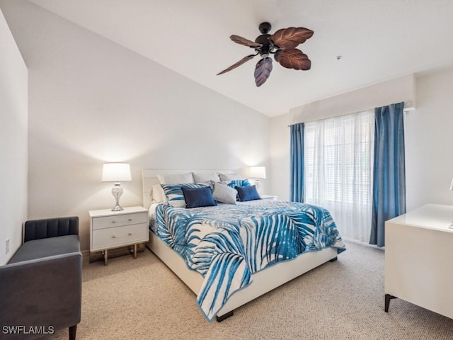 bedroom with light carpet and ceiling fan