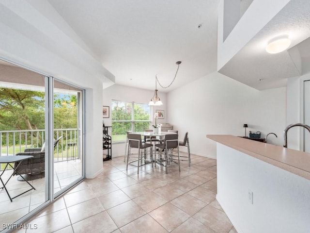 dining area with light tile patterned floors