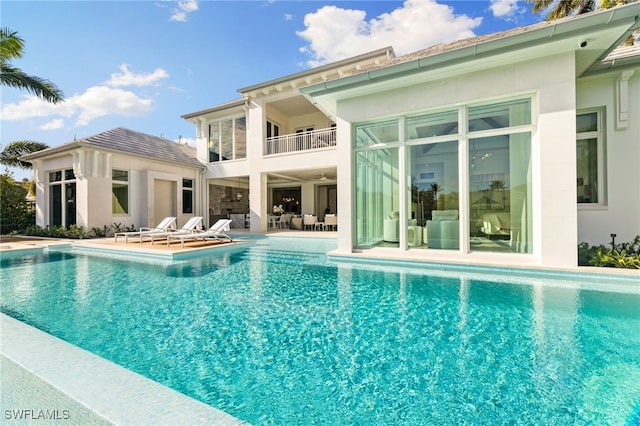 view of swimming pool with a patio