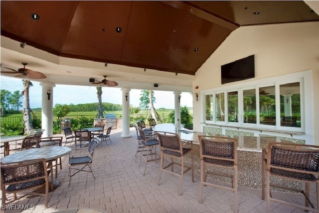 11987 Macquarie Way, Fort Myers, FL 33913 - view of patio / terrace with a ceiling fan and outdoor dining space