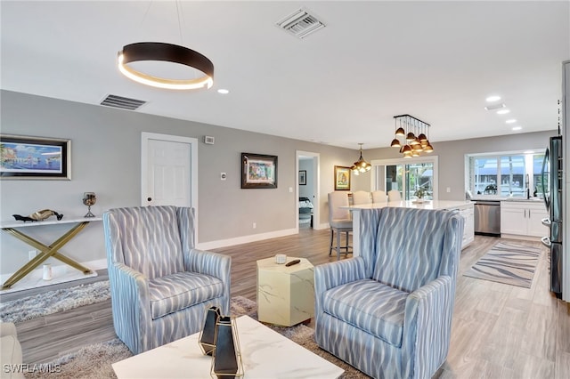 living room featuring light wood-type flooring