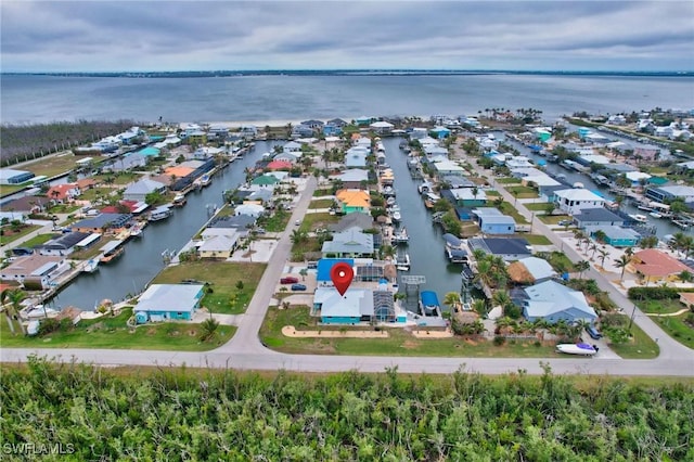 drone / aerial view featuring a water view