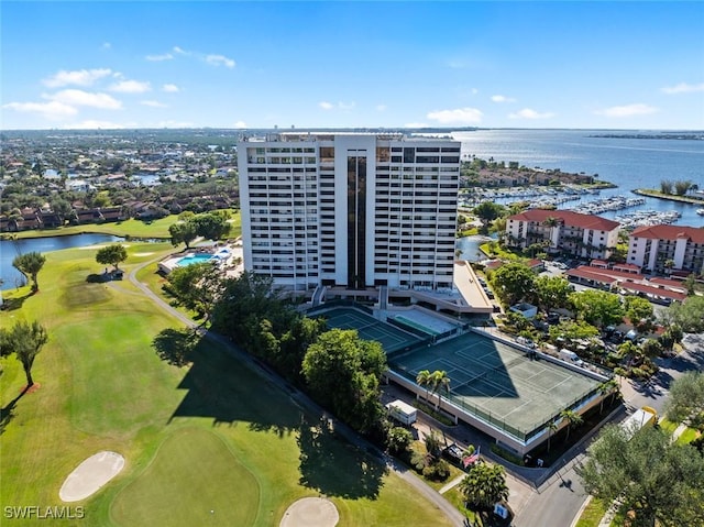 aerial view with view of golf course and a water view