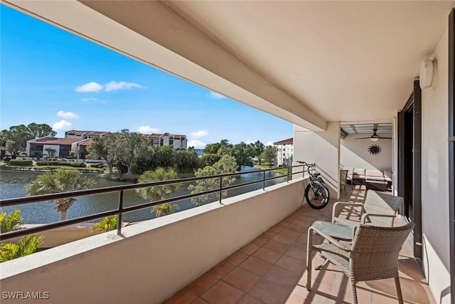 balcony featuring a water view