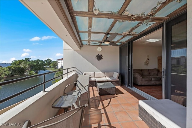 balcony featuring ceiling fan