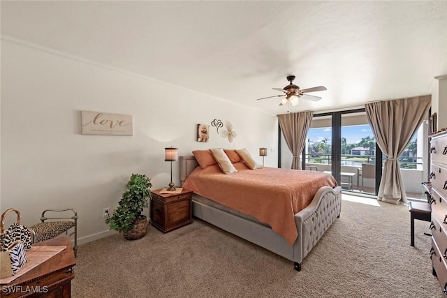 bedroom with access to exterior, ceiling fan, and carpet