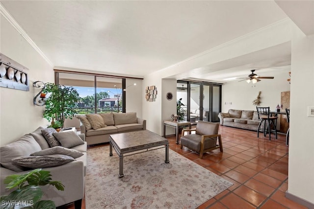 tiled living room featuring ornamental molding and ceiling fan