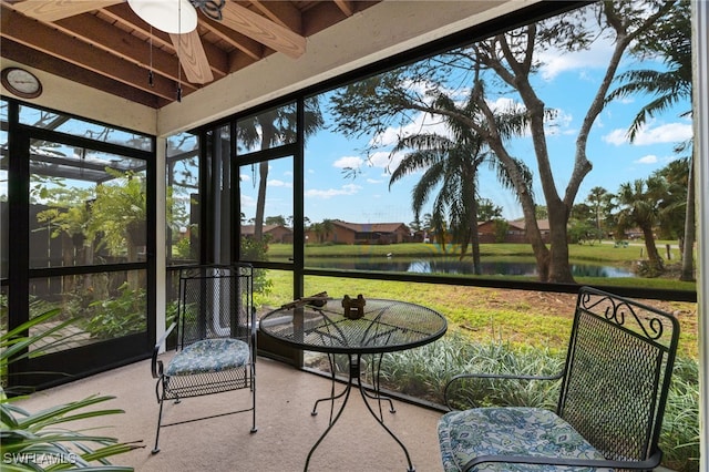 sunroom with a water view