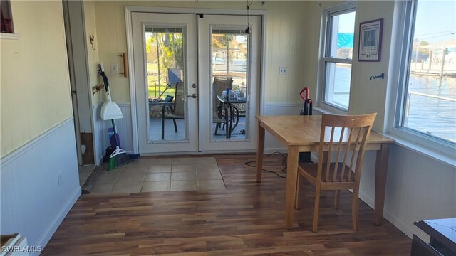 doorway to outside with french doors and wood finished floors