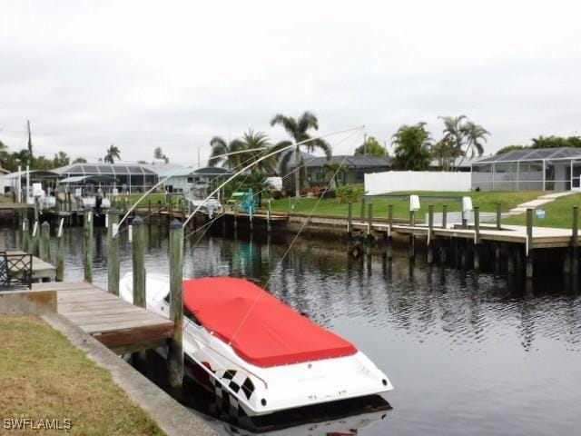 dock area with a water view