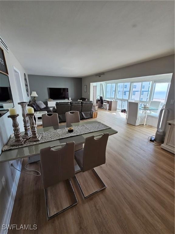 dining space featuring light hardwood / wood-style flooring