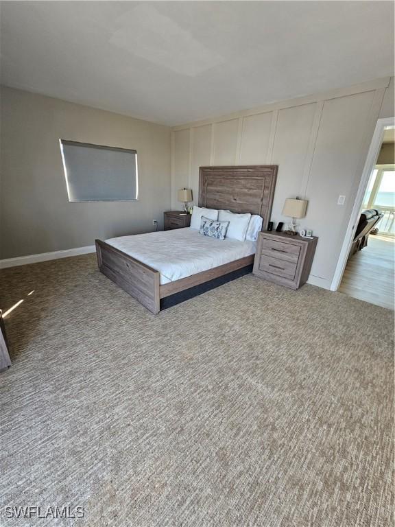 unfurnished bedroom featuring light colored carpet