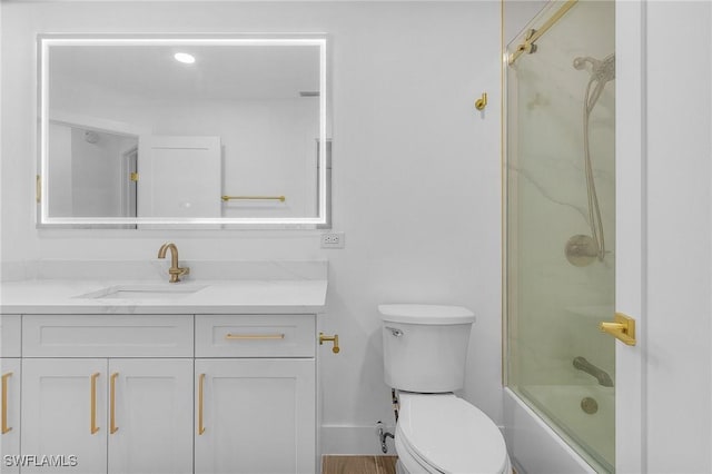 2657 Aft Ave, Naples, FL 34109 - full bathroom with enclosed tub / shower combo, vanity, and toilet