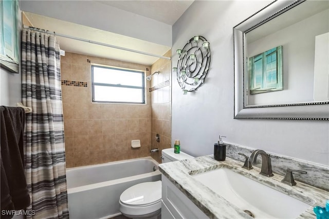 full bathroom with vanity, toilet, and shower / tub combo