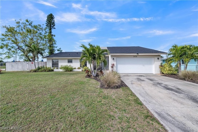 ranch-style home with a garage and a front yard