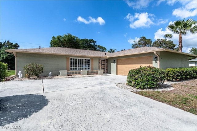 single story home featuring a garage