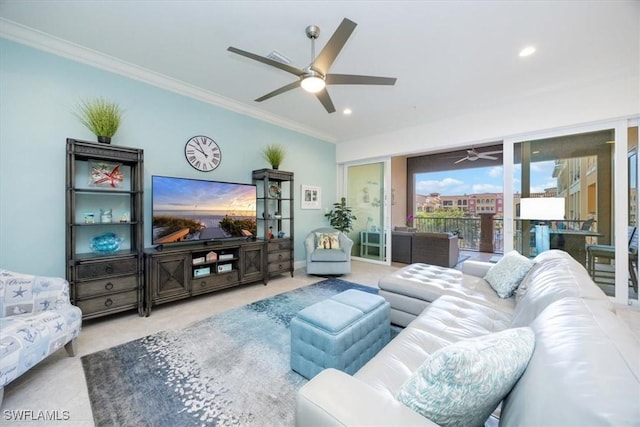 living room featuring carpet floors, ornamental molding, and ceiling fan