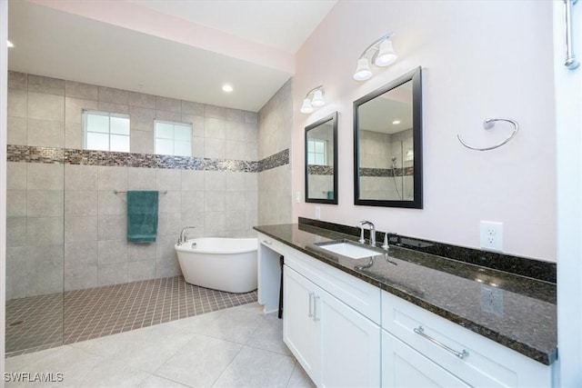 bathroom featuring vanity, tile patterned floors, and independent shower and bath