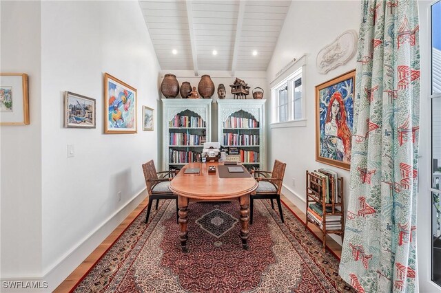 dining space with vaulted ceiling with beams, wooden ceiling, wood finished floors, and baseboards