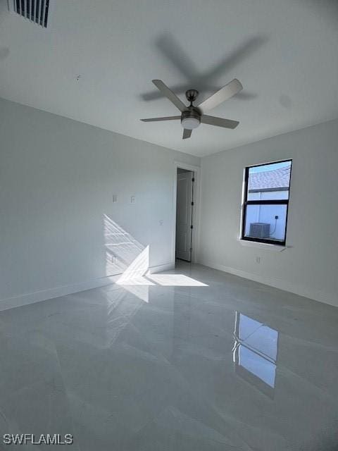 unfurnished room with concrete flooring and ceiling fan