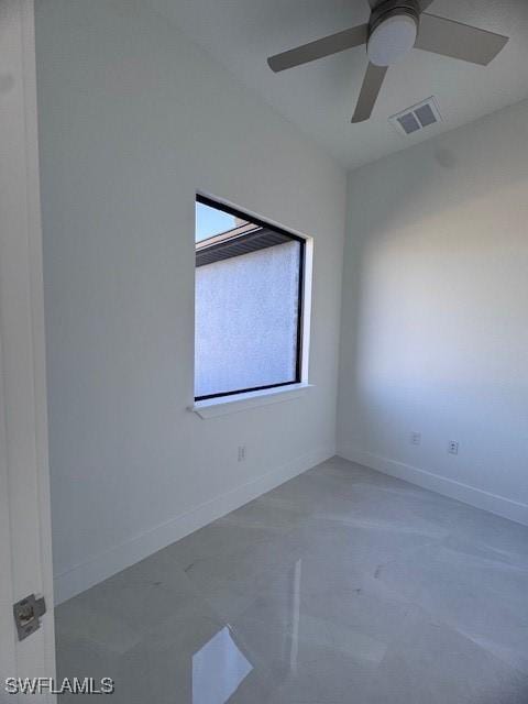 unfurnished room with ceiling fan