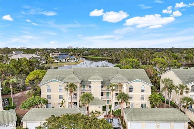 drone / aerial view with a water view