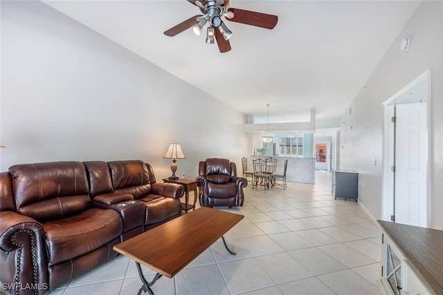 tiled living room with ceiling fan