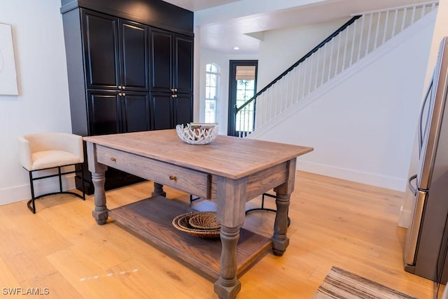 dining space featuring light hardwood / wood-style flooring