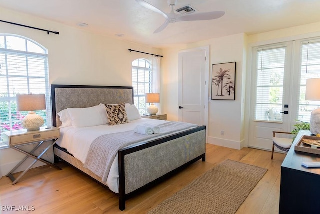 bedroom with ceiling fan and light wood-type flooring