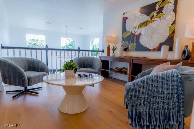 sitting room featuring light wood-type flooring