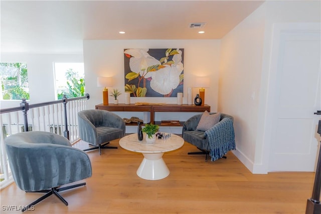 living area featuring light hardwood / wood-style floors