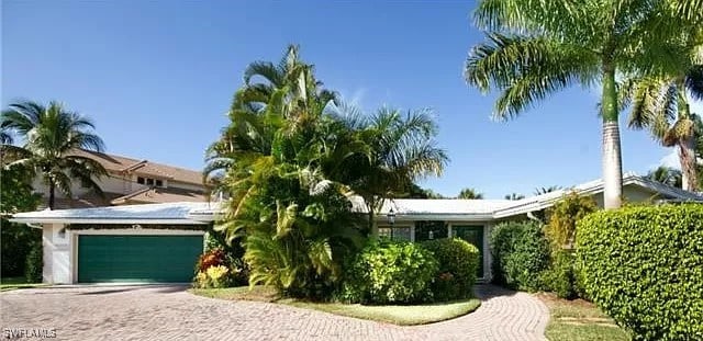 view of front of home with a garage