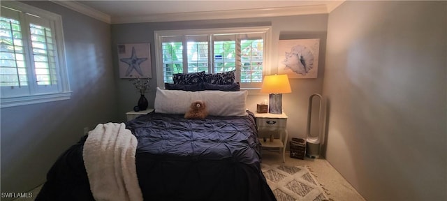 bedroom with ornamental molding