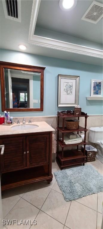 bathroom featuring tile patterned floors and vanity