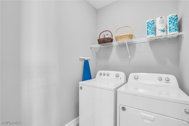 washroom with separate washer and dryer