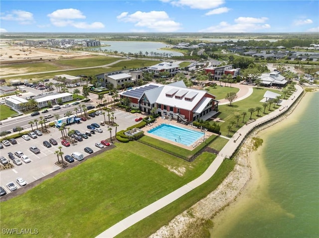 bird's eye view with a water view