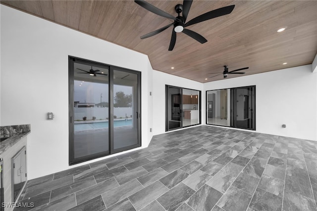 view of patio / terrace featuring ceiling fan