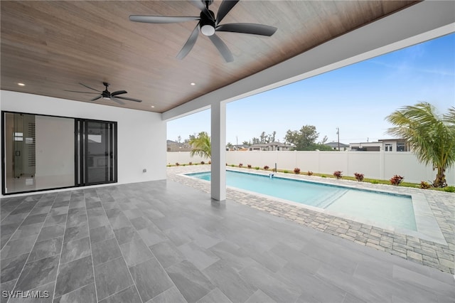 view of pool featuring a patio and ceiling fan