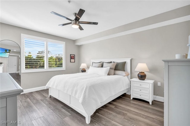 11041 Gulf Reflections Dr Unit 203, Fort Myers, FL 33908 - bedroom with hardwood / wood-style flooring and ceiling fan