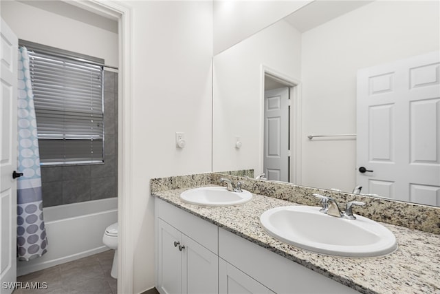 full bathroom featuring shower / bath combination with curtain, vanity, toilet, and tile patterned flooring