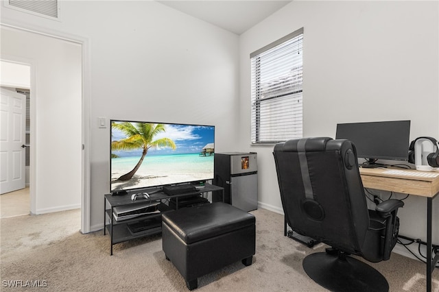 home office featuring light colored carpet